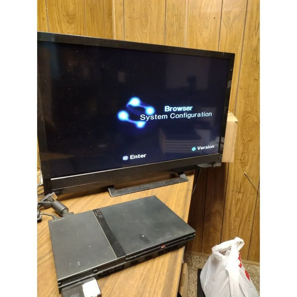 Sony Black Gaming Console with Controller